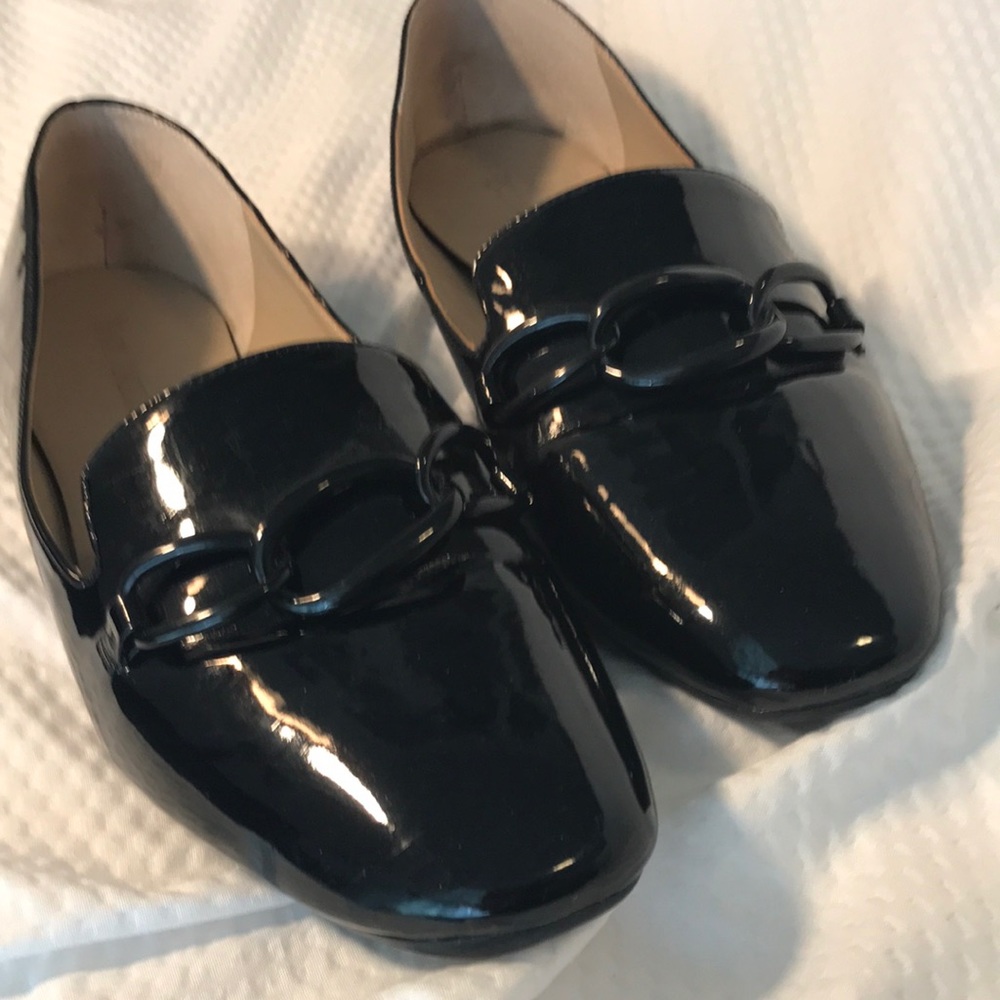 Black flats with black chain embellishments